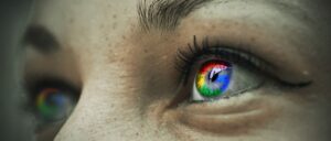 Google logo reflected in a woman's eyes